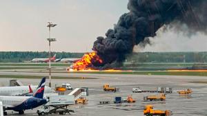 In this image provided by Riccardo Dalla Francesca shows smoke rises from a fire on a plane at Moscow&#39;s Sheremetyevo airport on Sunday, May 5, 2019. (Riccardo Dalla Francesca via AP)