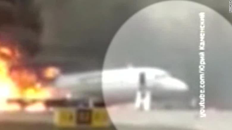 Video shows plane passengers escape by slide