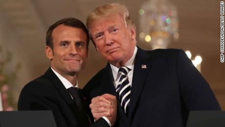 WASHINGTON, DC - APRIL 24:  French President Emmanuel Macron (L) and U.S. President Donald Trump embrace at the completion of a joint press conference in the East Room of the White House April 24, 2018 in Washington, DC. Macron and Trump met throughout the day to discuss a range of bilateral issues as Trump holds his first official state visit with the French president.  (Photo by Chip Somodevilla/Getty Images)