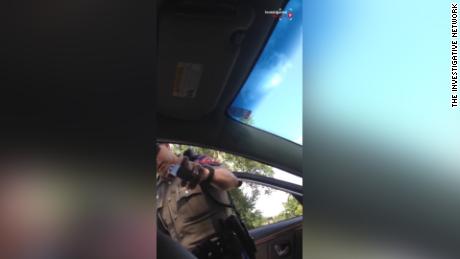 A weapon is pointed at Sandra Bland, her cell phone video of her July 2015 arrest shows.