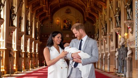 The Duke and Duchess of Sussex with their baby son, who was born on Monday morning, during a photocall in St. George&#39;s Hall at Windsor Castle.