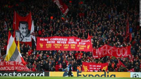 Liverpool fans celebrating their win over Barcelona.