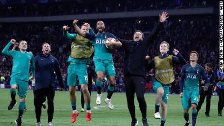 Tottenham&#39;s Brazilian forward Lucas Moura celebrates with teammates at the end of the UEFA Champions League semi-final second leg match.