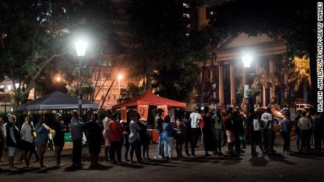 Voters rush to cast their votes hours before polling stations close at the Durban City Hall at the sixth national general elections in Durban on May 8.