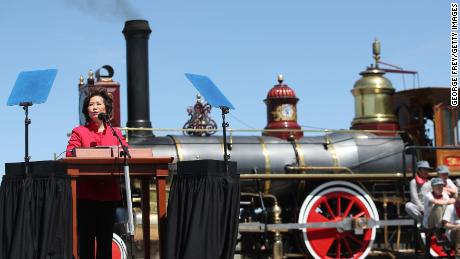 Secretary of Transportation Elaine Chao champions railroad workers at the 150th anniversary of the Golden Spike Ceremony on May 10.