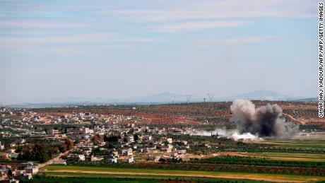 Smoke billows following shelling on the village of Sheikh Mustafa in the Idlib province Saturday. 