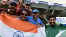 Indian and Pakistan cricket fan cheer in support of their national team during the one day international (ODI) Asia Cup cricket match between Pakistan and India at the Dubai International Cricket Stadium in Dubai on September 19, 2018. (Photo by Ishara S. KODIKARA / AFP)        (Photo credit should read ISHARA S. KODIKARA/AFP/Getty Images)