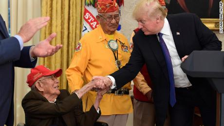 President Donald Trump met with Navajo Code Talker Fleming Begaye Sr., seated, in the White House in Washington, DC on Nov. 27, 2017.