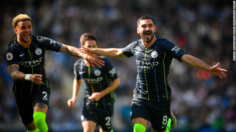 Manchester City celebrate winning the EPL title after victory against Brighton. 