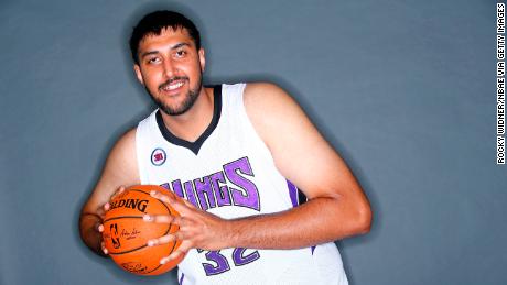SACRAMENTO, CA - SEPTEMBER 26:  Sim Bhullar #32 of the Sacramento Kings poses for a photo on media day September 26, 2014 at the Kings practice facility in Sacramento, California. NOTE TO USER: User expressly acknowledges and agrees that, by downloading and/or using this Photograph, user is consenting to the terms and conditions of the Getty Images License Agreement. Mandatory Copyright Notice: Copyright 2014 NBAE (Photo by Rocky Widner/NBAE via Getty Images)