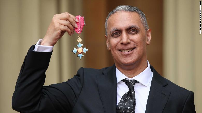 Nitin Sawhney holds his CBE for services to music at Buckingham Palace on May 9, 2019 in London, England.