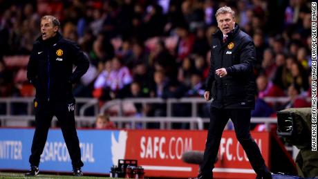 Moyes, then manager of Manchester United (R), with then assistant coach Phil Neville, who is now England Women&#39;s manager.