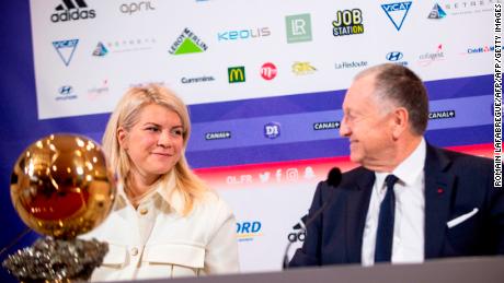 Hegerberg (L) with Lyon&#39;s French President Jean-Michel Aulas. 