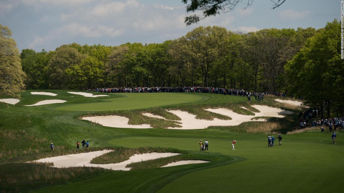 Alex Noren takes stock on the third hole of this thrillingly difficult golf course. If you miss the fairway and the bunkers, the long grass will eat you alive.