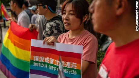 TAIPEI, TAIWAN - MAY 16: LGBT rights protesters demonstrate outside a parliamentary administration building where politicians are continuing to discuss same-sex marriage bills ahead of a vote on Friday, on May 16, 2019 in Taipei, Taiwan. Taiwan&#39;s parliament on Tuesday began efforts to reconcile three competing bills on same-sex marriage that will determine how same-sex relationships are defined in the future. The conclusions reached during Tuesday&#39;s negotiations are expected to be put to a parliamentary vote on May 17. Implementation of the bill put forward by the executive branch of the government, or a failure to deliver a bill, would see Taiwan becoming the first country in Asia to legalise same-sex marriage. (Photo by Carl Court/Getty Images)