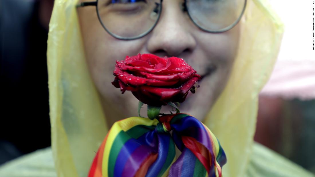 A supporter stands outside the parliament building as the debate over the three draft bills of the same-sex marriage law  continued inside.&lt;br /&gt;&lt;br /&gt;&lt;br /&gt;debate the three draft bills for marriage equality on Friday.