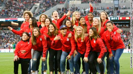 Members of the 1999 Women&#39;s World Cup-winning team pose for a photo at halftime of a game between U.S. Women and Belgian Women at Banc of California Stadium on April 07, 2019 in LA. 