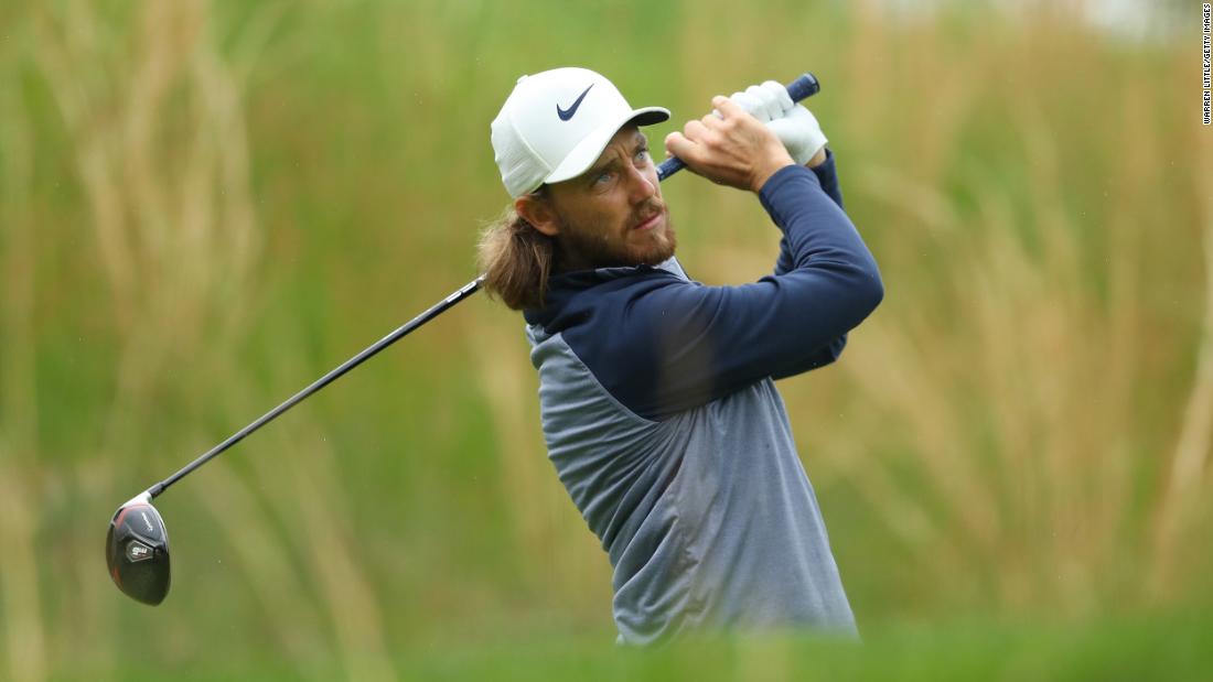 Tommy Fleetwood plays a shot from the fourth tee.