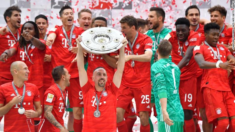 Franck Ribery celebrates with the Bundesliga trophy after his last game for the German giant.