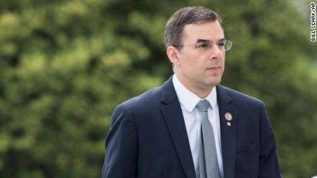 Rep. Justin Amash, R-Mich., walks up the House steps for a vote in the Capitol on Thursday, May 9, 2019. 