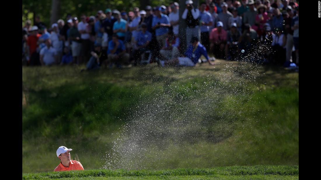 Jordan Spieth hits out of a bunker onto the fifth green during the third round of the PGA Championship golf tournament on Saturday, May 18.