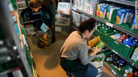 A file photograph of volunteers at London foodbank preparing food parcels in 2017.