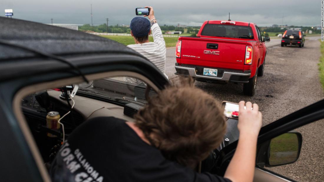 Brandon Alexander, 18; and Daniel Brown, 48, are local storm chasers who followed the storm to Perry, Oklahoma. &quot;We&#39;ve only been doing this for about a year,&quot; Brown said May 20.