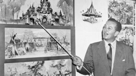 Walt Disney points to sketches of Sleeping Beauty&#39;s Castle in 1955, four years before the company released the animated film. 