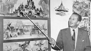 Walt Disney points to sketches of Sleeping Beauty&#39;s Castle in 1955, four years before the company released the animated film. 