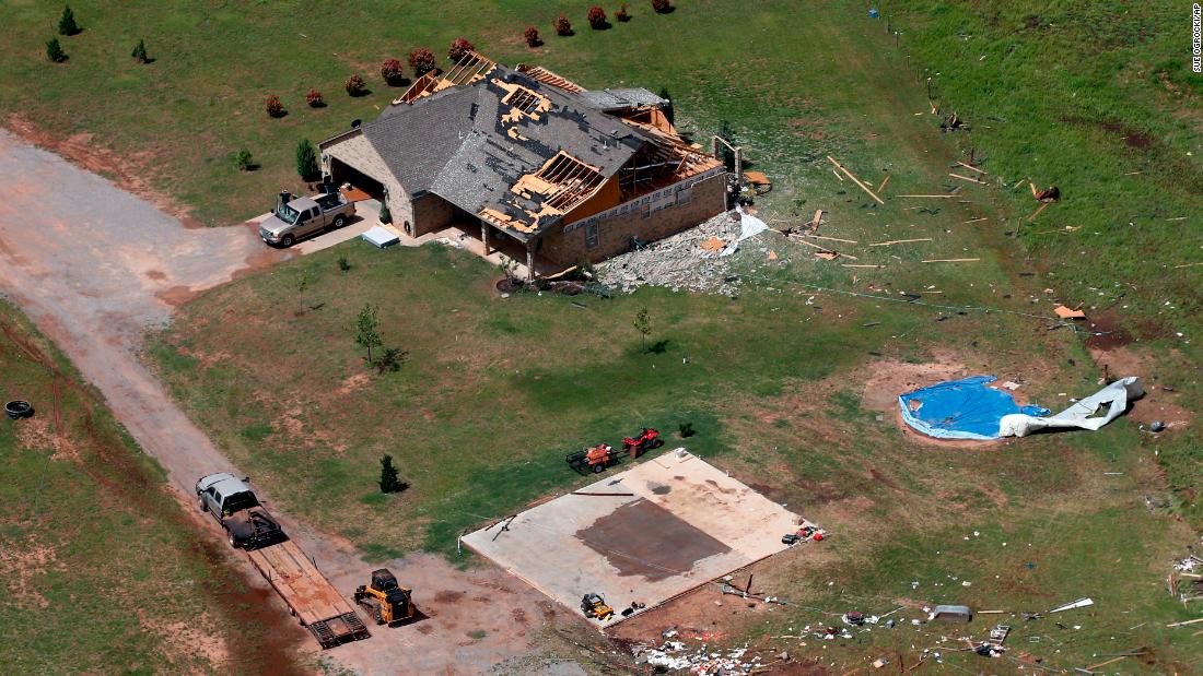 A house damaged by a tornado is seen in Mangum, Oklahoma, Tuesday, May 21.