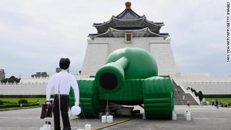 An artwork of Tank Man by Taiwanese artist Shake, inspired by a sketch of dissident Chinese artist Baidiucao, is on display in front of Chiang Kai-shek Memorial Hall in Taipei on May 21, 2019.