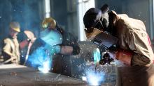 This photo taken on May 3, 2018 shows a worker cutting steel at a factory in Huaibei in China's eastern Anhui province. - China's surplus with the United States widened in April, underlining an imbalance between the economic titans as they struggle to reach an agreement on averting a potentially damaging trade war. (Photo by - / AFP) / China OUT        (Photo credit should read -/AFP/Getty Images)