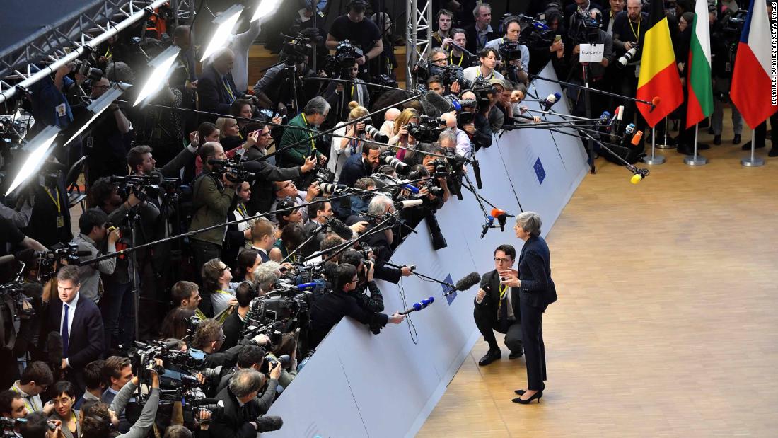 May speaks to the press in March 2019 as she arrives in Brussels, Belgium, for the first day of an EU summit focused on Brexit.