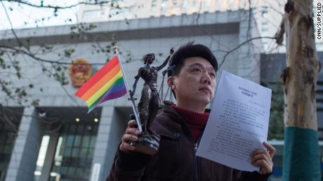 LGBT activist Peng Yanhui outside Beijing court when he won his case in December 2014.