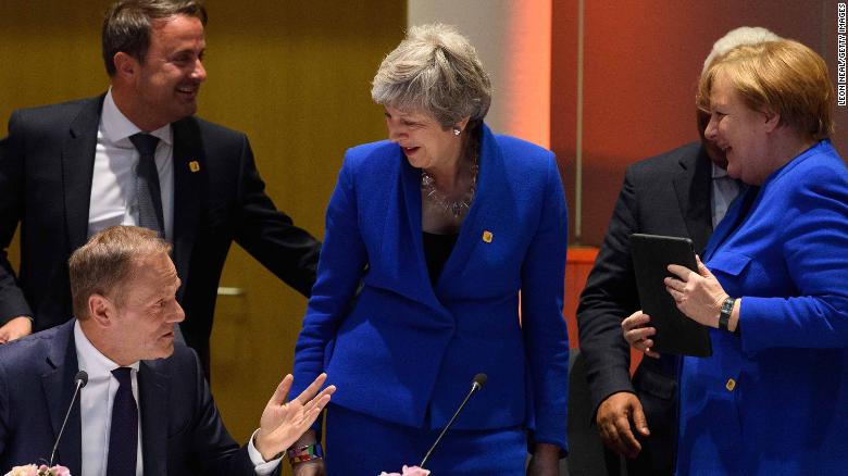 Theresa May with European leaders in Brussels. They came to disrust anything she said.