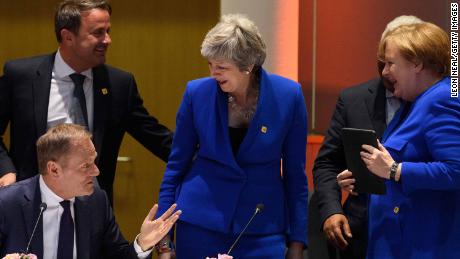 Theresa May with European leaders in Brussels. They came to disrust anything she said.