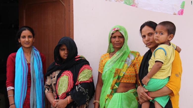 Pawan Kumar&#39;s cousin (left), wife, Nisha Devi; mother, Savitri Devi; and sister, Deep Mala at their family home in the village of Khairthal near Alwar in Rajasthan.