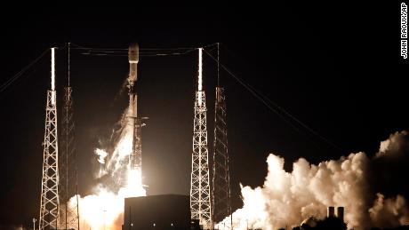 A Falcon 9 SpaceX rocket, with a payload of 60 satellites for SpaceX&#39;s Starlink broadband network, lifts off from Space Launch Complex 40 at the Cape Canaveral Air Force Station in Cape Canaveral, Fla., Thursday, May 23, 2019. (AP Photo/John Raoux)