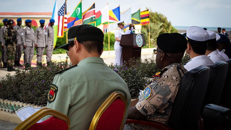 The Chinese contingent takes their seats as US Rear Adm. Heidi Berg takes to the podium to formally launch the US-led military exercise, Cutlass Express.