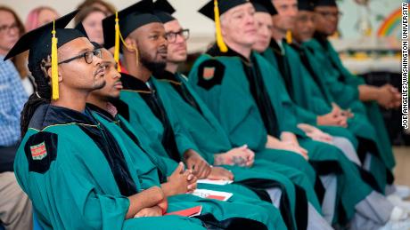 It looks like any other graduation -- except these graduates earned their degrees in prison - CNN
