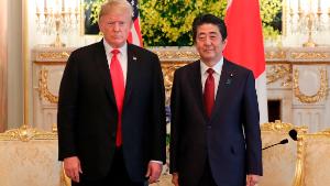 TOKYO, JAPAN - MAY 27: U.S. President Donald Trump (L) and Japanese Prime Minister Shinzo Abe pose for a photo ahead of their meeting at Akasaka Palace, Japanese state guest house on May 27, 2019 in Tokyo, Japan. President Trump is on the third day of a four day state visit to Japan, the first official visit of the country's Reiwa era. Alongside a number of engagements, Mr Trump was guest of honour at a Sumo wrestling match on Sunday and is expected to meet families of North Korean abductees. (Photo by Eugene Hoshiko - Pool/Getty Images)