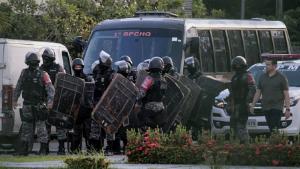 Brazilian riot police prepare to invade the Puraquequara Prison facility at Bela Vista community, Puraquequara neighborhood at the city of Manaus, Amazonas state on May 27, 2019. - At least 40 inmates were killed in four jails in northern Brazil on Monday, authorities said, in the latest wave of violence to rock the country&#39;s severely overpopulated and dangerous prison system. (Photo by Sandro Pereira / AFP)        (Photo credit should read SANDRO PEREIRA/AFP/Getty Images)