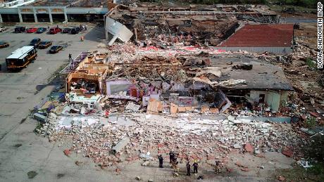 A shopping center in Dayton, Ohio, lies in shambles after a tornado struck Tuesday. 