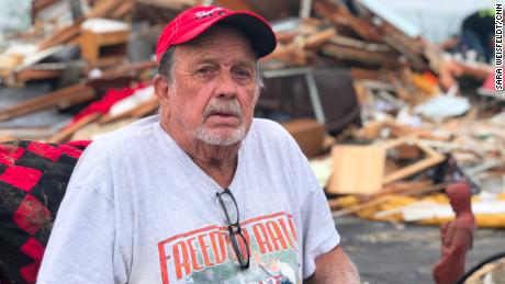 Ron Jones sits near what's left of his home after an EF-4 tornado hammered Linwood. 