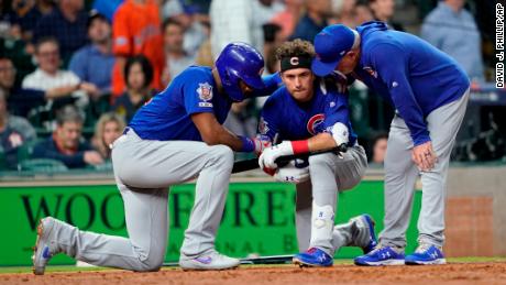 Chicago Cubs&#39; Albert Almora Jr. is consoled after hitting a foul ball into the stands. 