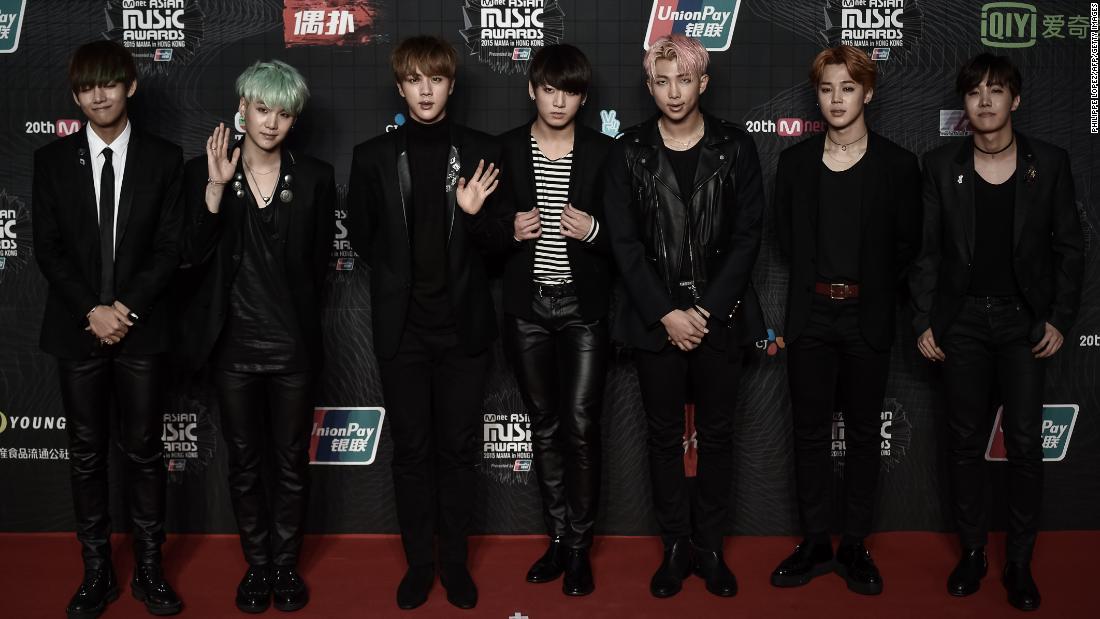 BTS pose on the red carpet of the 2015 Mnet Asian Music Awards in Hong Kong on December 2, 2015. BTS scooped the award for World Performer.  