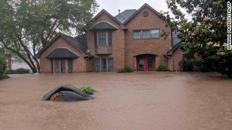 Flood waters surround homes in Fort Smith, Arkansas, on Wednesday.