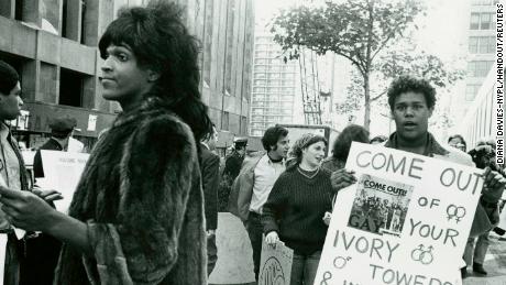 A 1970 photo of Marsha P. Johnson handing out flyers in support of Gay Students at NYU is seen here courtesy of the New York Public Library.