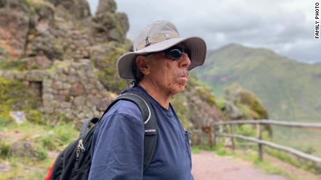 Carlos Valpeoz takes a break from walking around the Pisac Archeological Park. He has been searching for his daughter in Peru since she went missing.