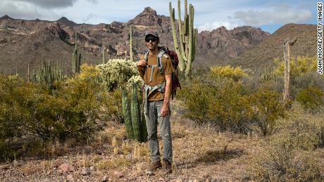 Scott Warren, a volunteer for the humanitarian aid organization No More Deaths, delivered food and water along migrant trails in Arizona in May. He is on trial for aiding border crossers.